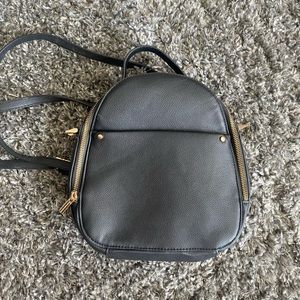 Black Purse/Backpack with gold detail